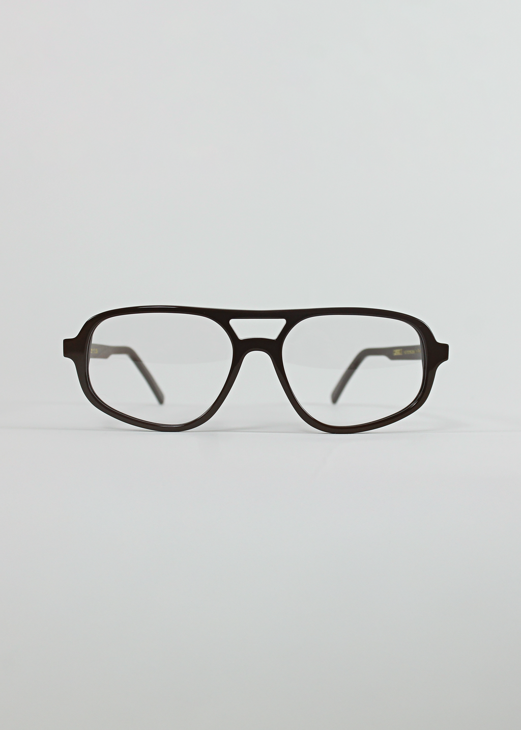 Black eyeglasses on a light gray background
