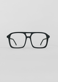 Black eyeglasses on a light gray background