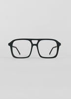 Black eyeglasses on a light gray background
